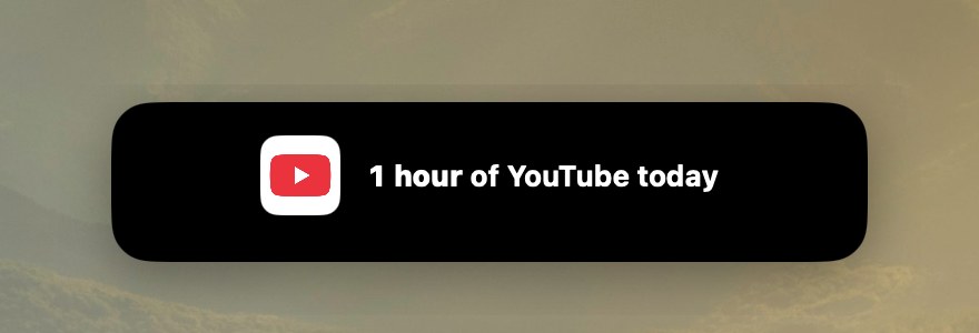 On a screen without a notch, a nudge drops from the top center: 1 hour of YouTube today.
